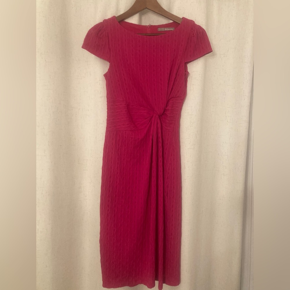 Marks and Spencer hot pink, figure-hugging dress.